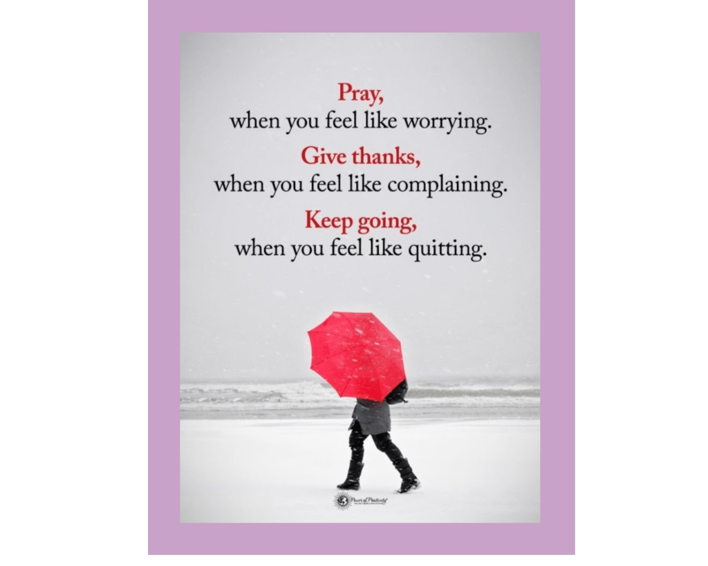 A bright red umbrella obscures the face of a person wearing dark boots and a gray coat, walking on a snowy beach. The text alternates between red and black. and says, "Pray, when you feel like worrying. Give thanks, when you feel like complaining. Keep going, when you feel like quitting." The logo at the bottom says, "Power of Positivity."